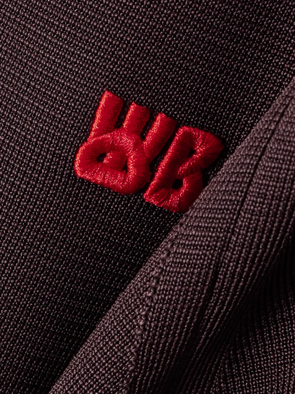 Close-up detail of the Wales Bonner Tide Striped Knitted Track Jacket