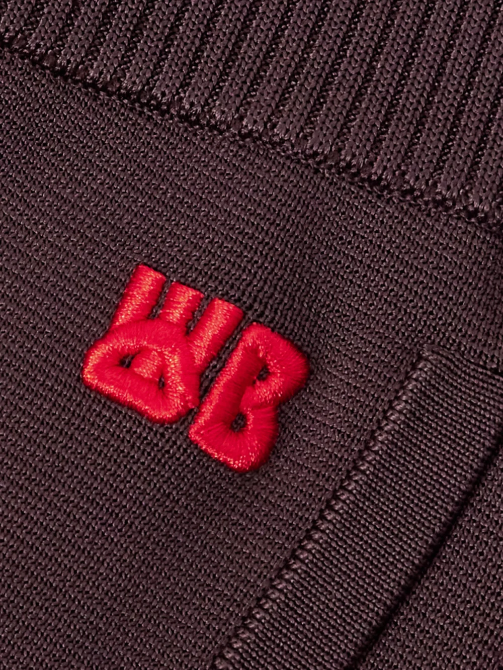 Close-up detail of the Wales Bonner Tide Striped Knitted Track Pants