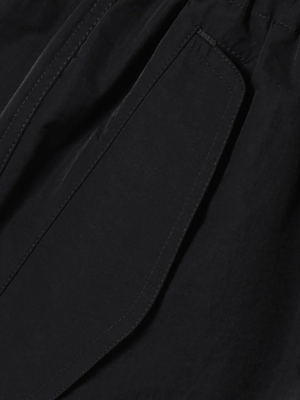 Close-up detail of the WARDROBE.NYC Beach Cotton-blend Shell Shorts