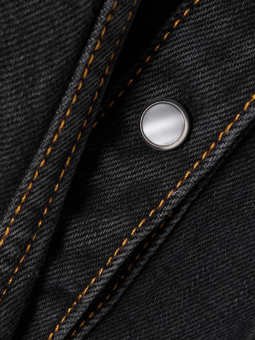 Close-up detail of the WARDROBE.NYC Contour Denim Jacket