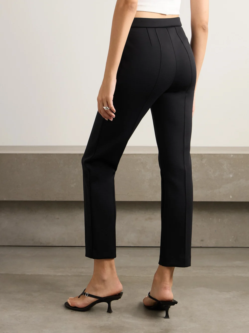 Back view of the WARDROBE.NYC Cropped Stretch-ponte Straight-leg Pants
