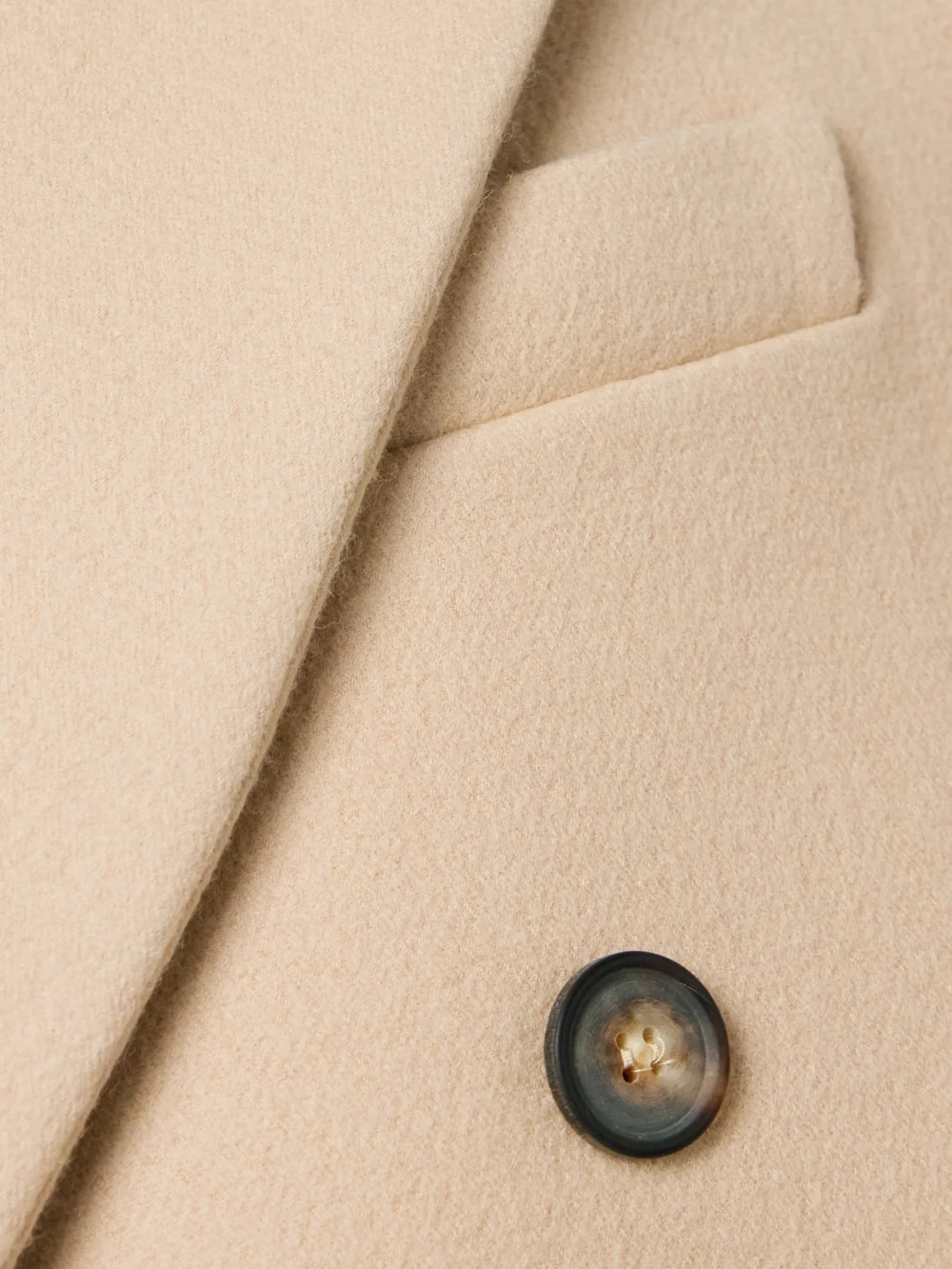 Close-up detail of the WARDROBE.NYC + Hailey Bieber Double-breasted Wool Coat