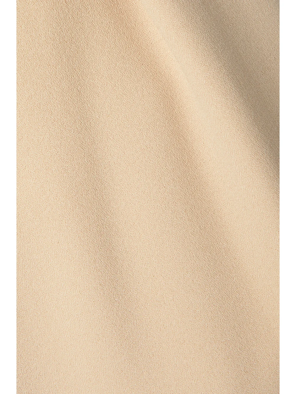 Close-up detail of the WARDROBE.NYC + Hailey Bieber Pleated Wool Wide-leg Pants