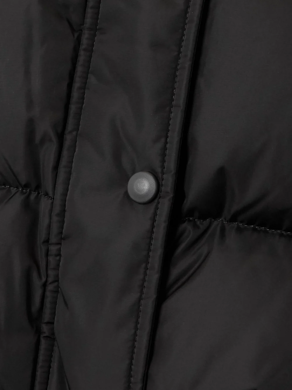 Close-up detail of the WARDROBE.NYC + Net-a-porter Hooded Quilted Padded Shell Down Jacket