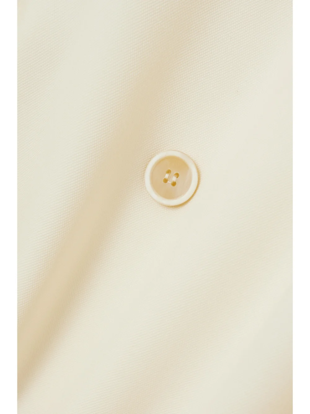Close-up detail of the WARDROBE.NYC Oversized Double-breasted Grain De Poudre Wool Coat