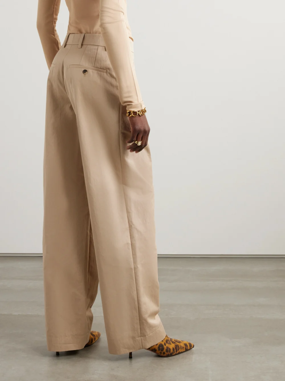 Back view of the WARDROBE.NYC Pleated Cotton-blend Drill Wide-leg Pants