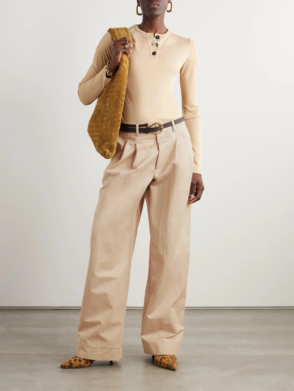 WARDROBE.NYC Pleated Cotton-blend Drill Wide-leg Pants, worn by a model