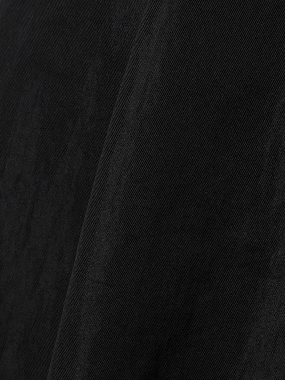 Close-up detail of the WARDROBE.NYC Pleated Cotton-blend Twill Wide-leg Pants