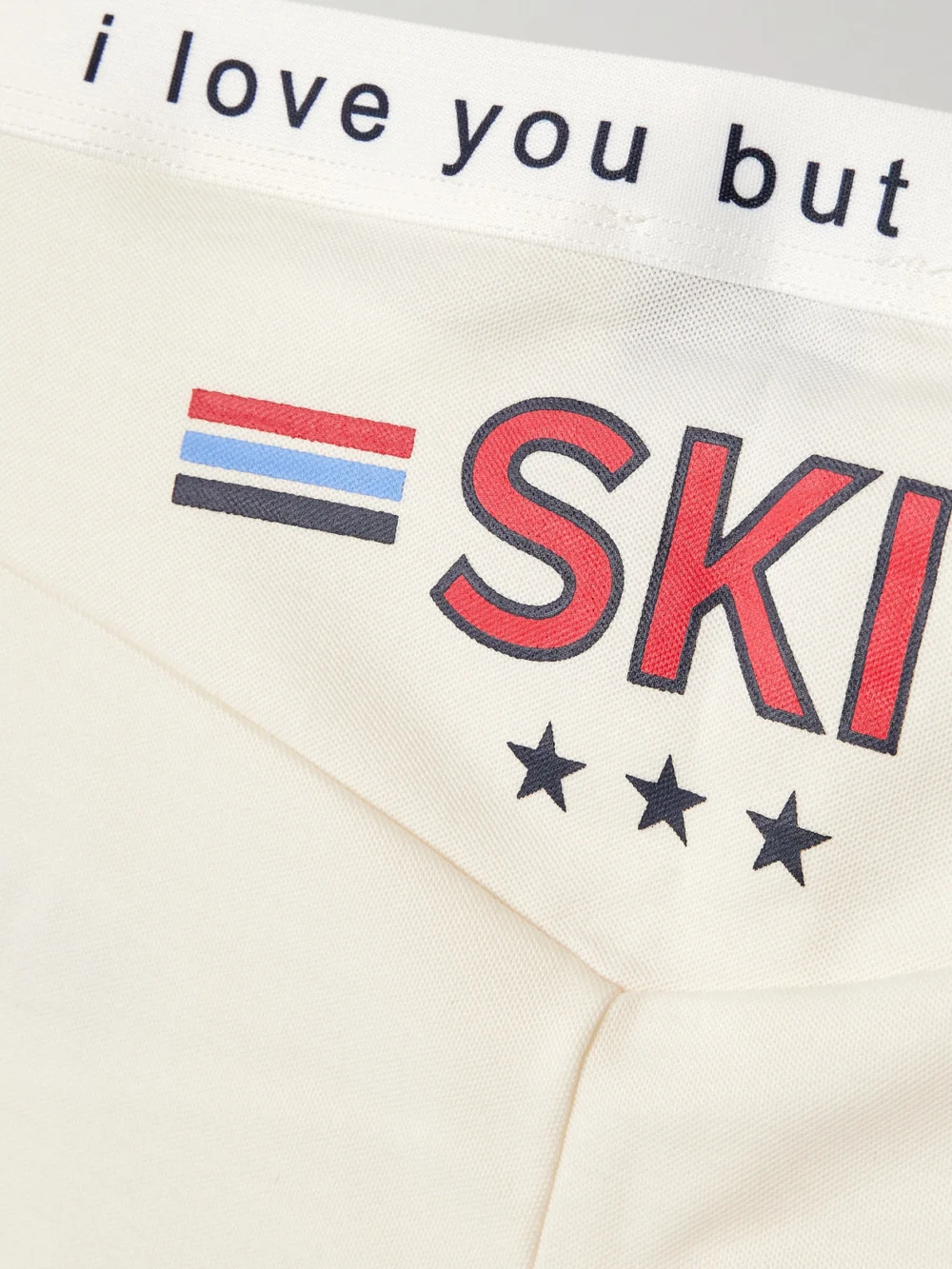 Close-up detail of the We Norwegians Bibi Printed Merino Wool-blend Piqué Leggings
