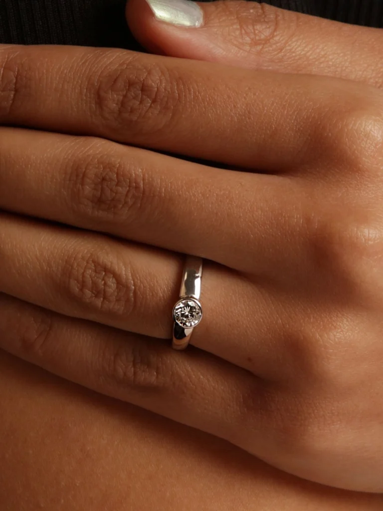 William May Platinum 0.55ct Diamond Rubover Solitaire Ring