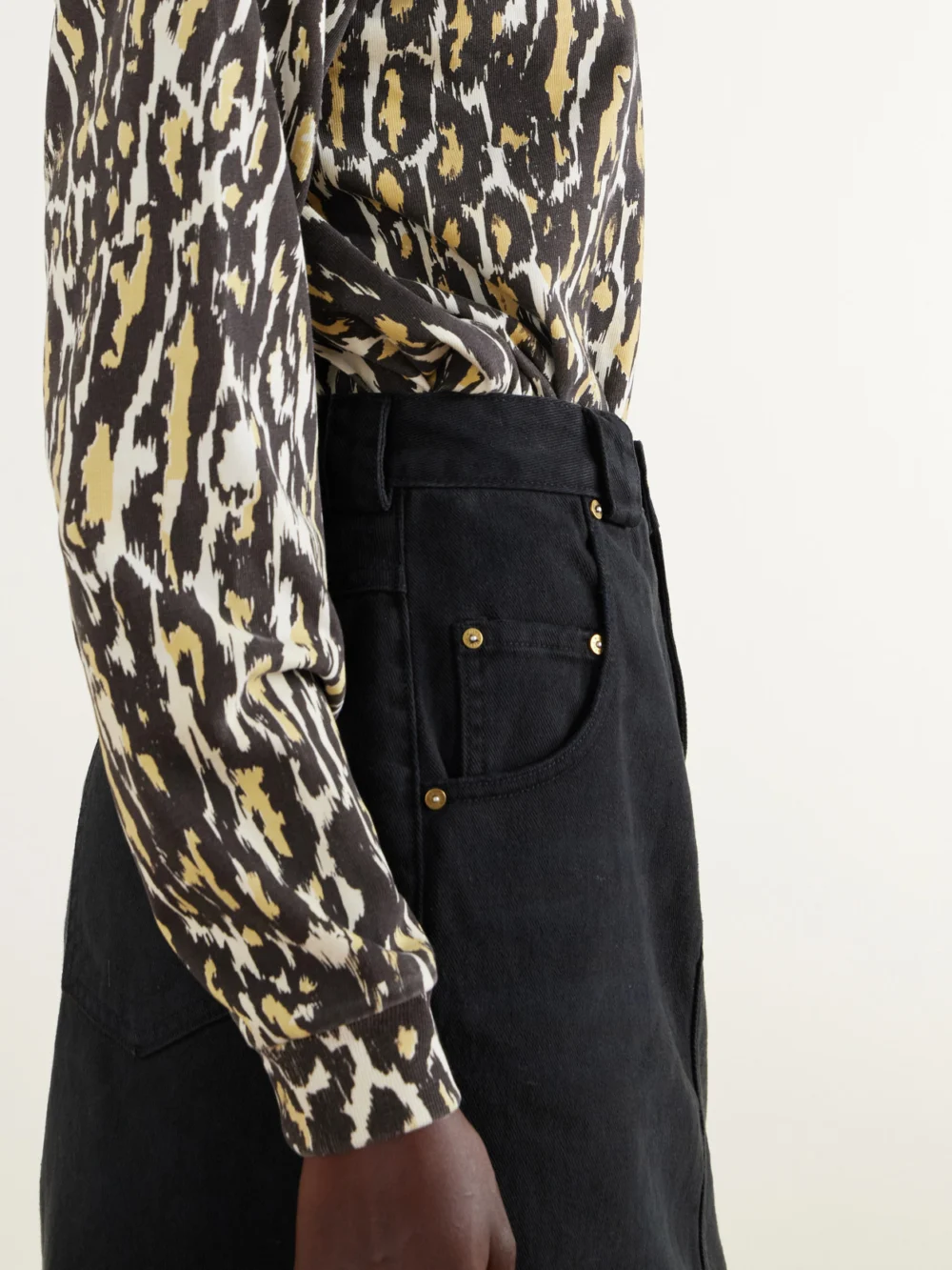Close-up detail of the Willy Chavarria Bad Girl Faded Denim Knee-lenght Skirt