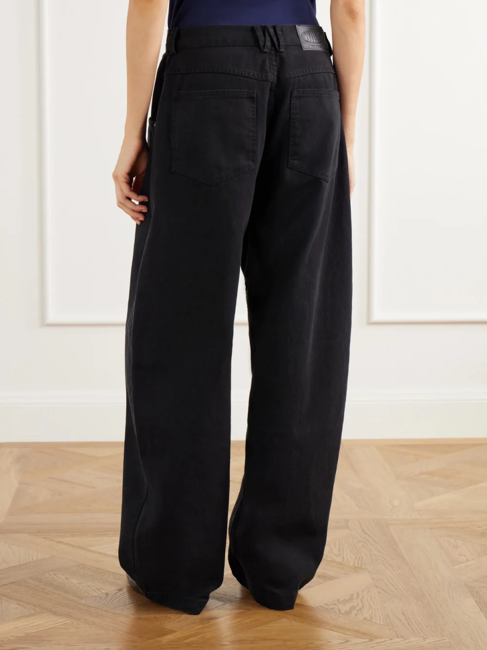 Back view of the Willy Chavarria Bad Girl Faded Mid-rise Wide-leg Jeans