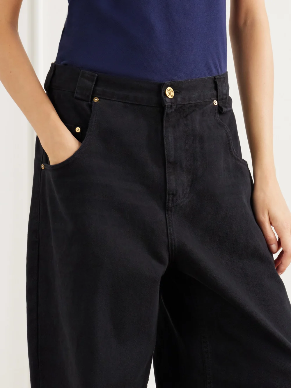 Close-up detail of the Willy Chavarria Bad Girl Faded Mid-rise Wide-leg Jeans