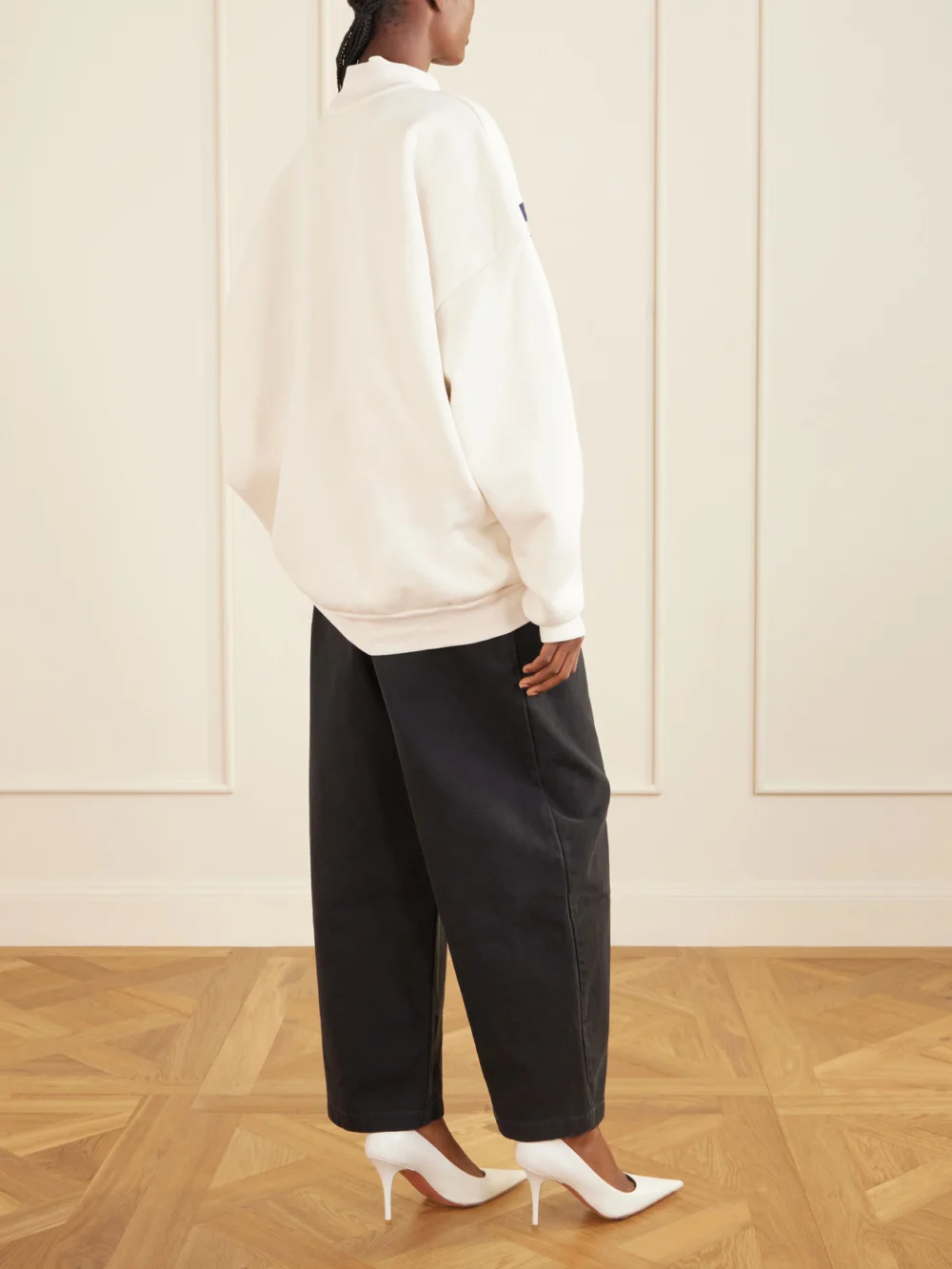 Back view of the Willy Chavarria Oversized Embroidered Striped Cotton-jersey Sweater