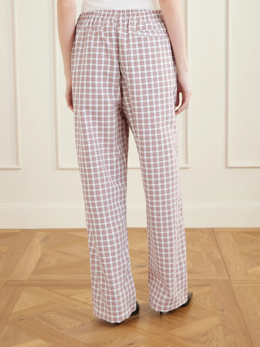 Back view of the Willy Chavarria Ruff Rider Checked Woven Wide-leg Pants