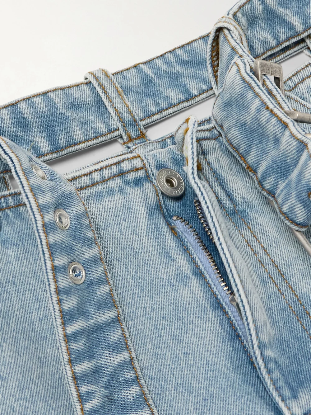 Close-up detail of the Y/Project Evergreen Belted Cut-out Organic High-rise Straight-leg Jeans