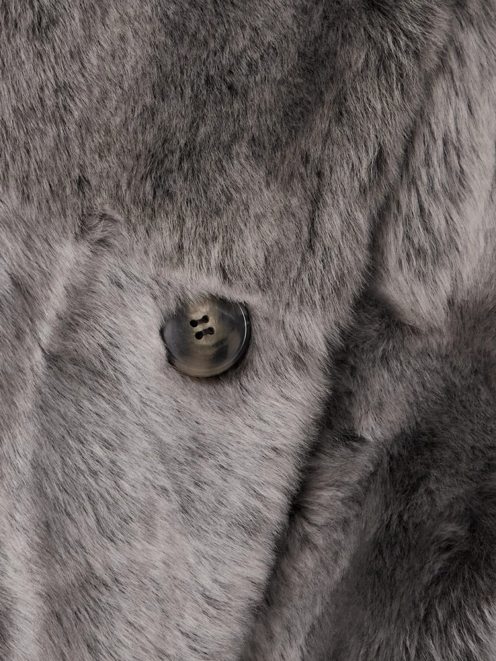 Close-up detail of the Yves Salomon Double-breasted Shearling Coat