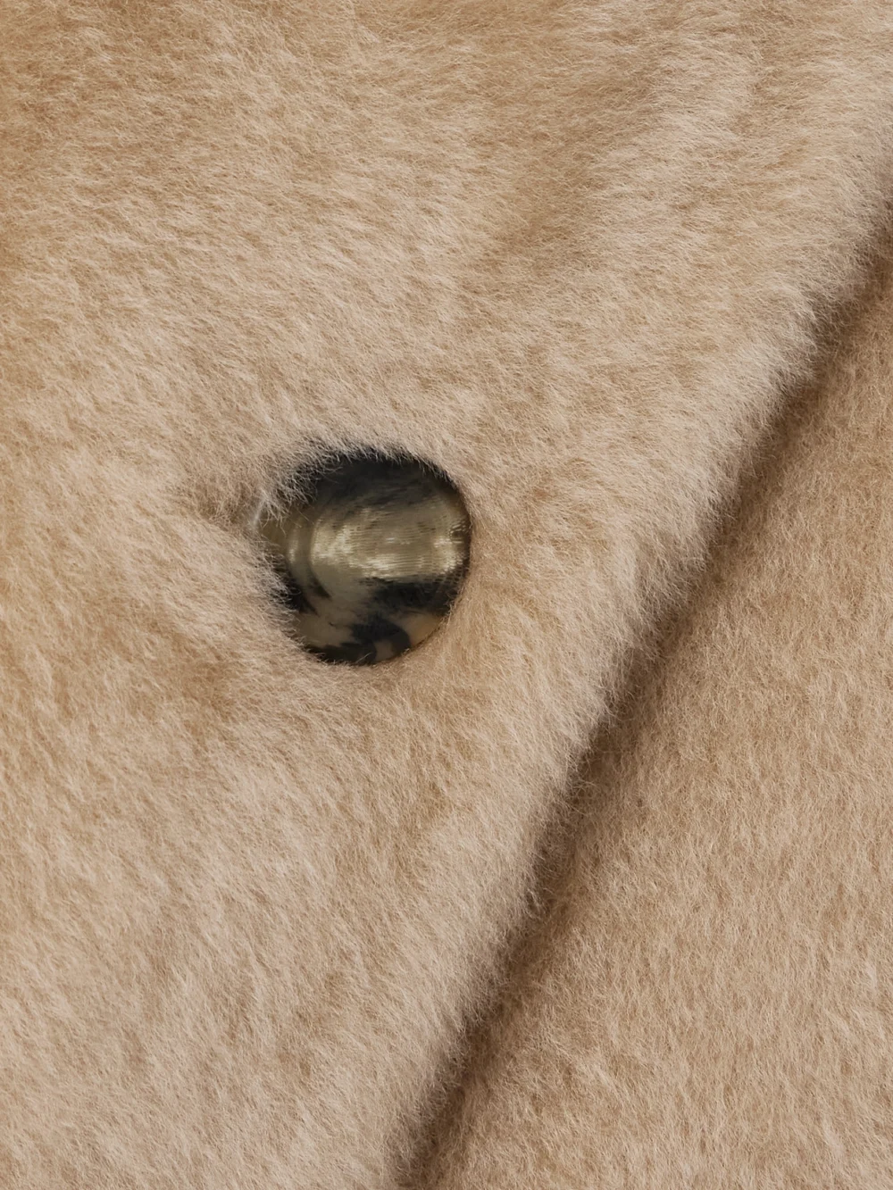 Close-up detail of the Yves Salomon Hooded Belted Shearling Coat