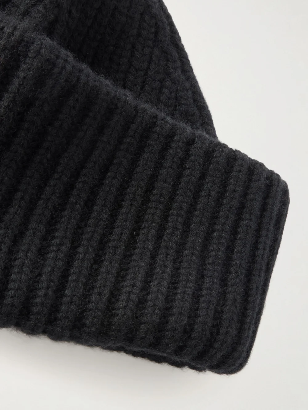 Close-up detail of the Yves Salomon Ribbed Wool and Cashmere-blend Beanie