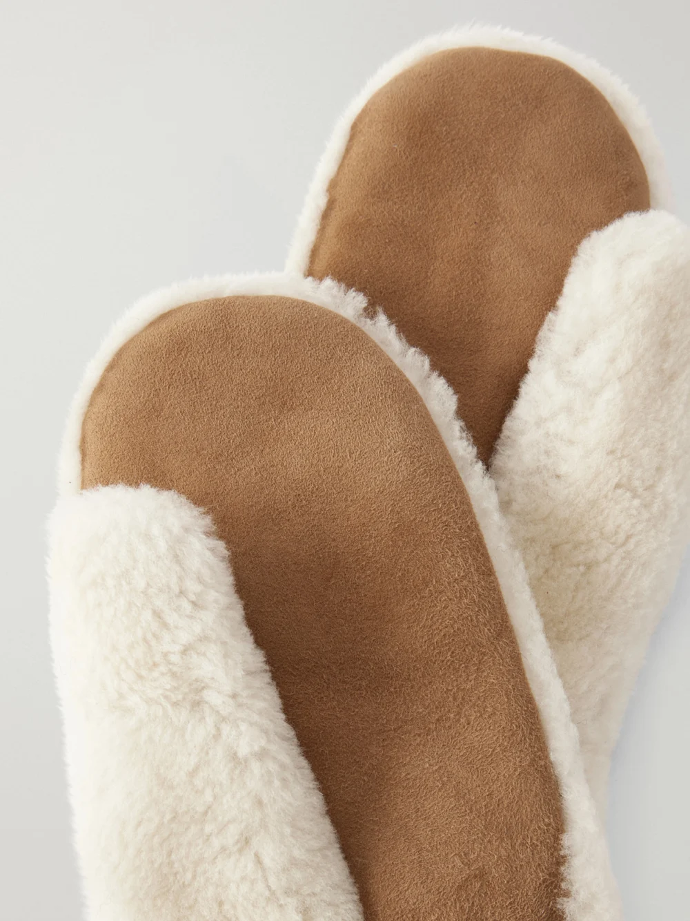 Close-up detail of the Yves Salomon Shearling-trimmed Suede Gloves