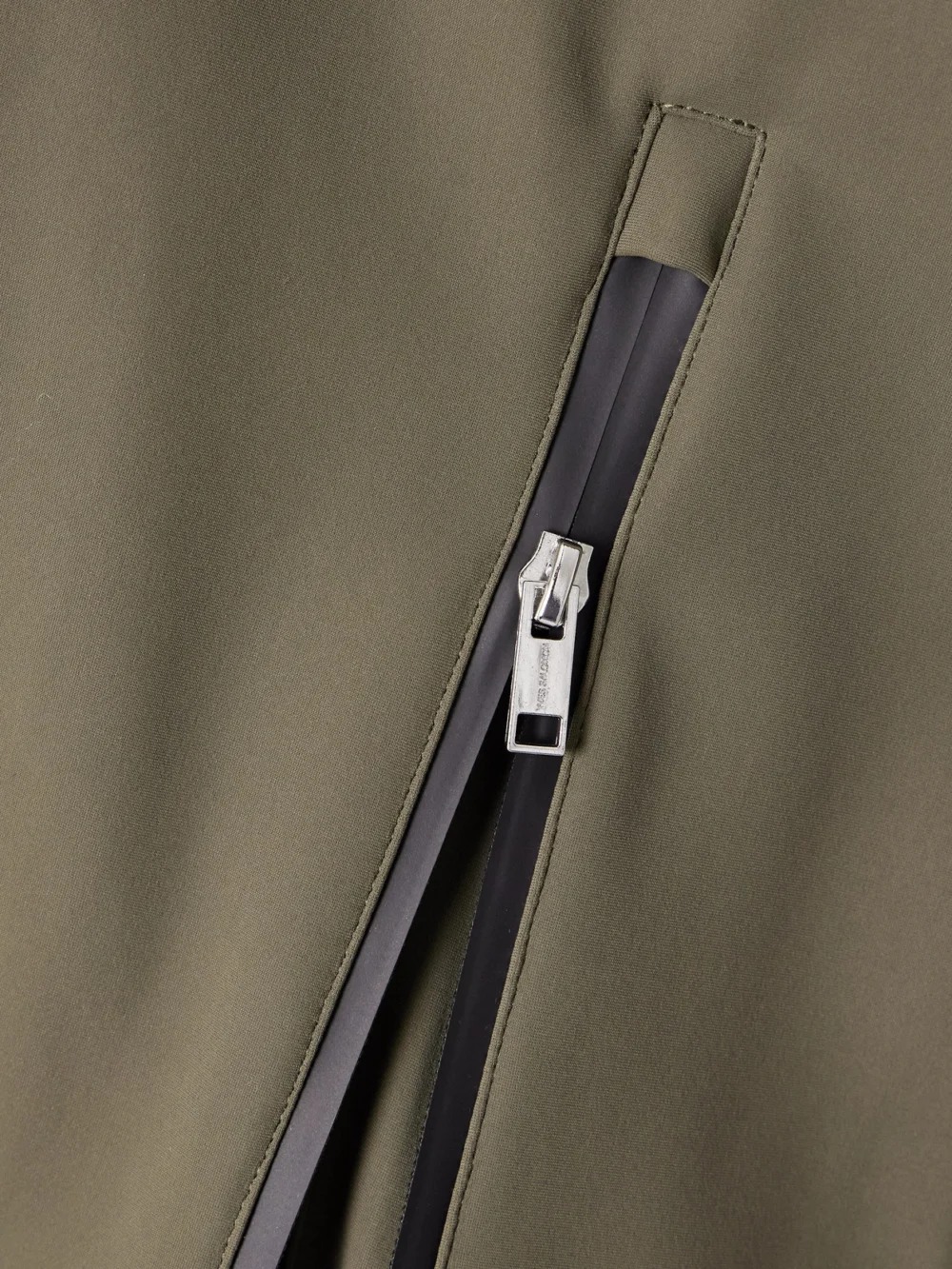 Close-up detail of the Yves Salomon Shell Flared Ski Pants