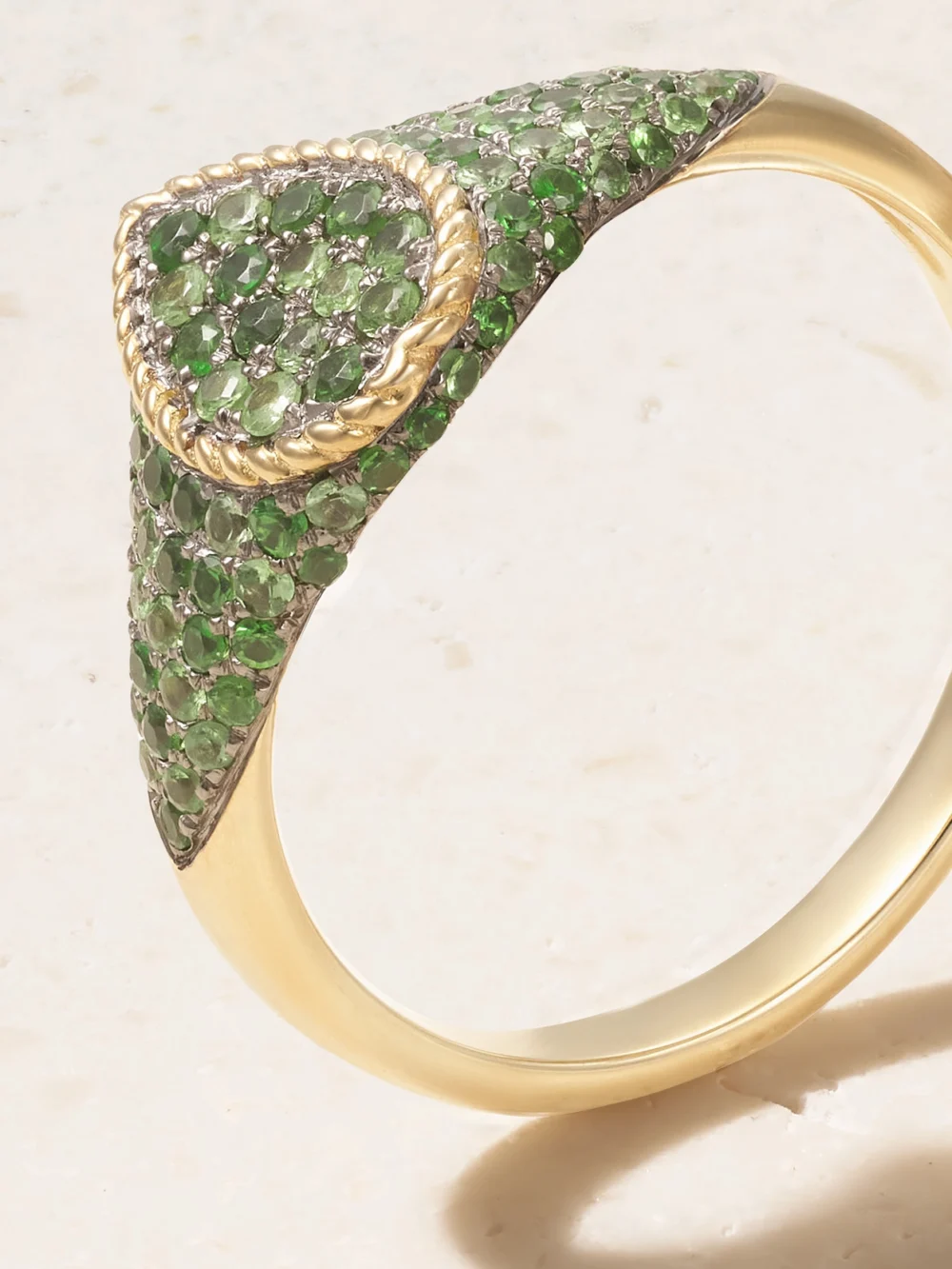 Close-up detail of the Yvonne Léon Baby Chevaliere 9-karat Gold Tsavorite Ring