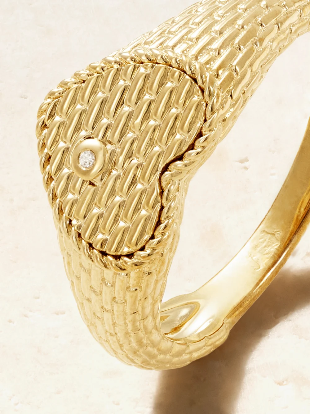 Close-up detail of the Yvonne Léon Baby Chevalière Coeur 9-karat Gold Diamond Signet Ring