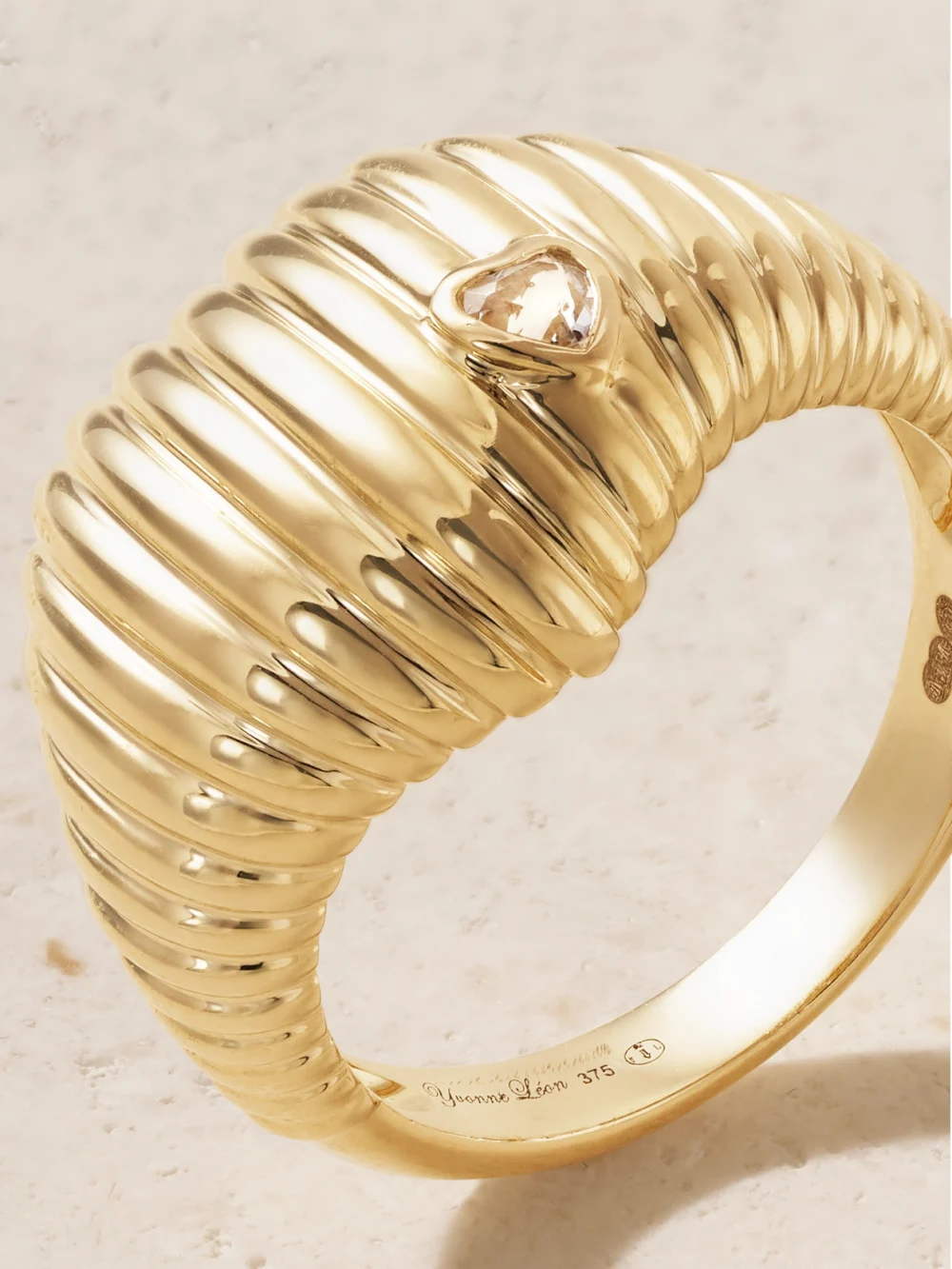 Close-up detail of the Yvonne Léon Chevaliere Berlingot 9-karat Gold Topaz Signet Ring