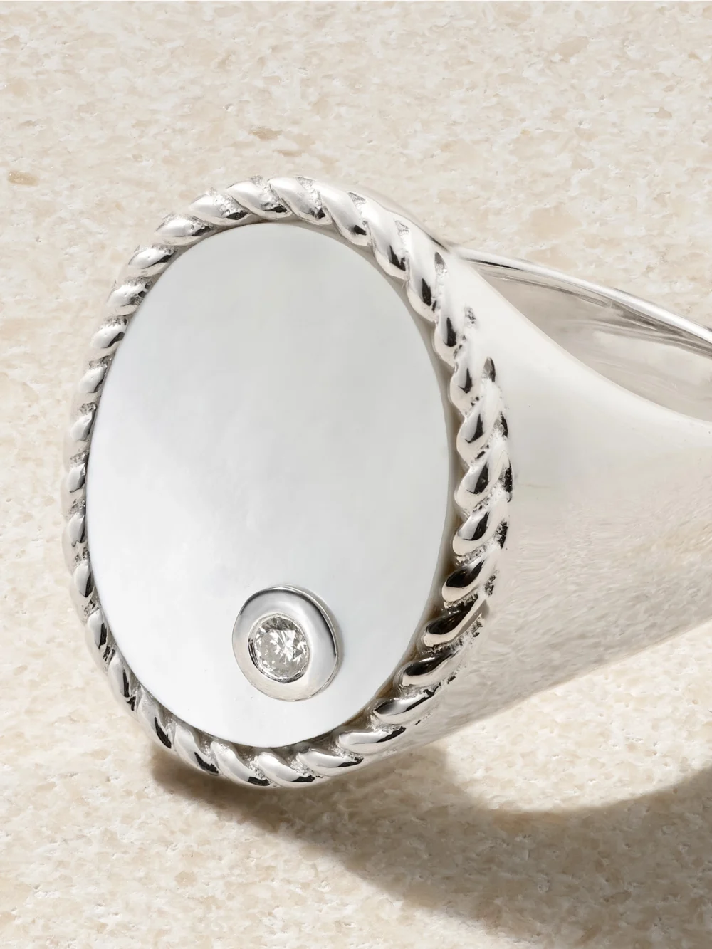 Close-up detail of the Yvonne Léon Chevalière Ovale 9-karat White Gold, Mother-of-pearl and Diamond Signet Ring