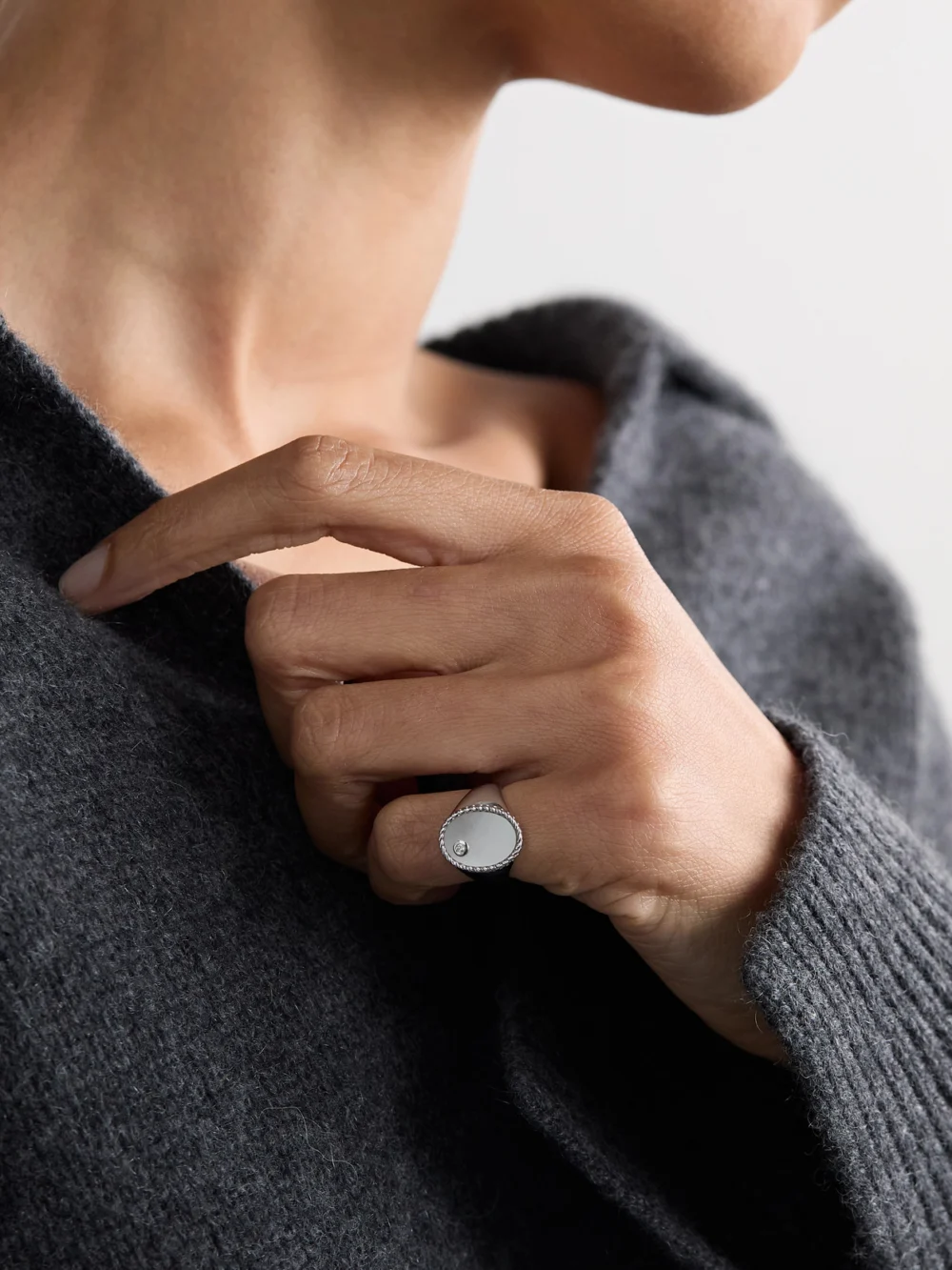 Yvonne Léon Chevalière Ovale 9-karat White Gold, Mother-of-pearl and Diamond Signet Ring, styled view
