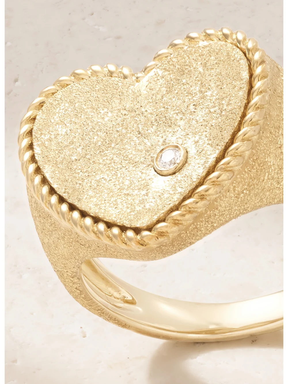 Close-up detail of the Yvonne Léon Coeur Pailletee 9-karat Gold Diamond Ring