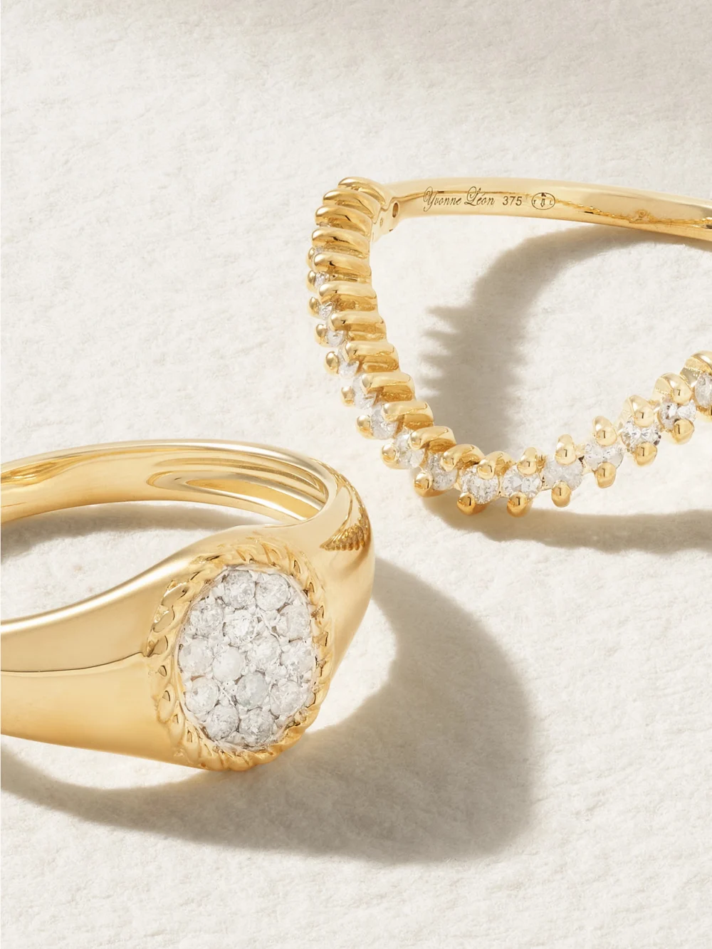 Close-up detail of the Yvonne Léon Mini Chevalière + Alliance Set of Two 9-karat Gold Diamond Signet Rings