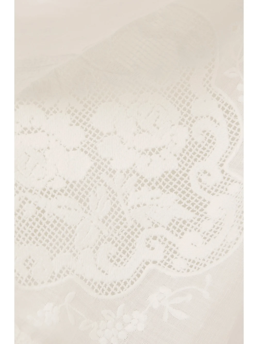 Close-up detail of the Zimmermann Alight Lace-trimmed Ramie Bustier Mini Dress