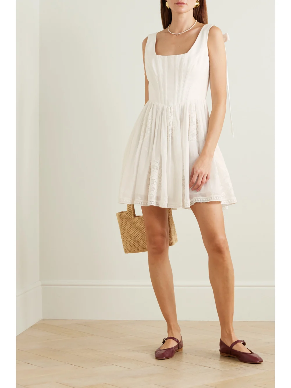 Zimmermann Alight Lace-trimmed Ramie Bustier Mini Dress, worn by a model