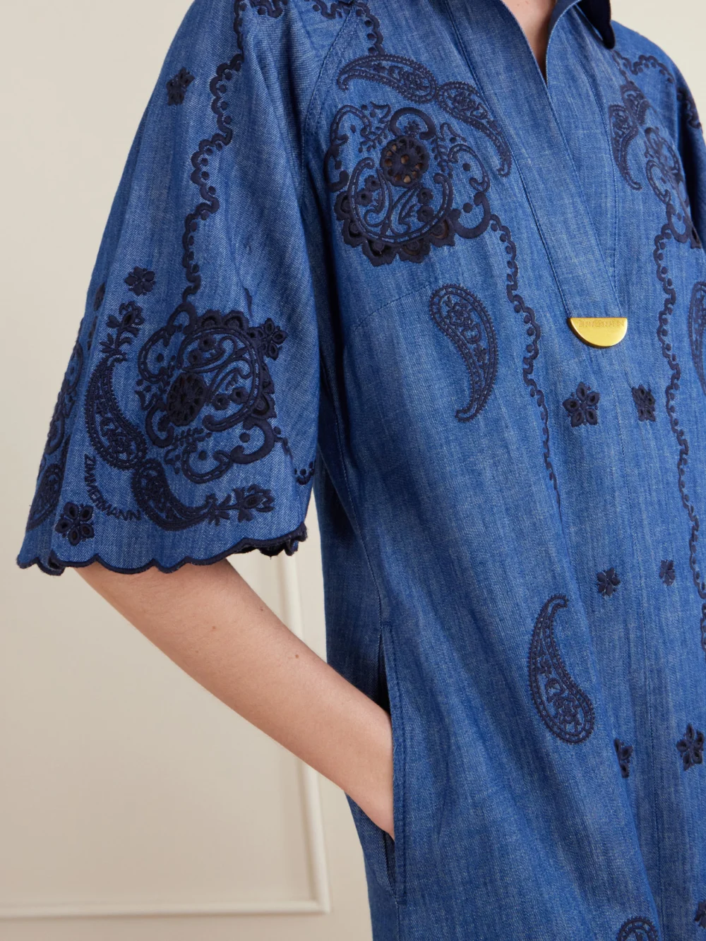 Close-up detail of the Zimmermann Aster Embroidered Denim Midi Dress