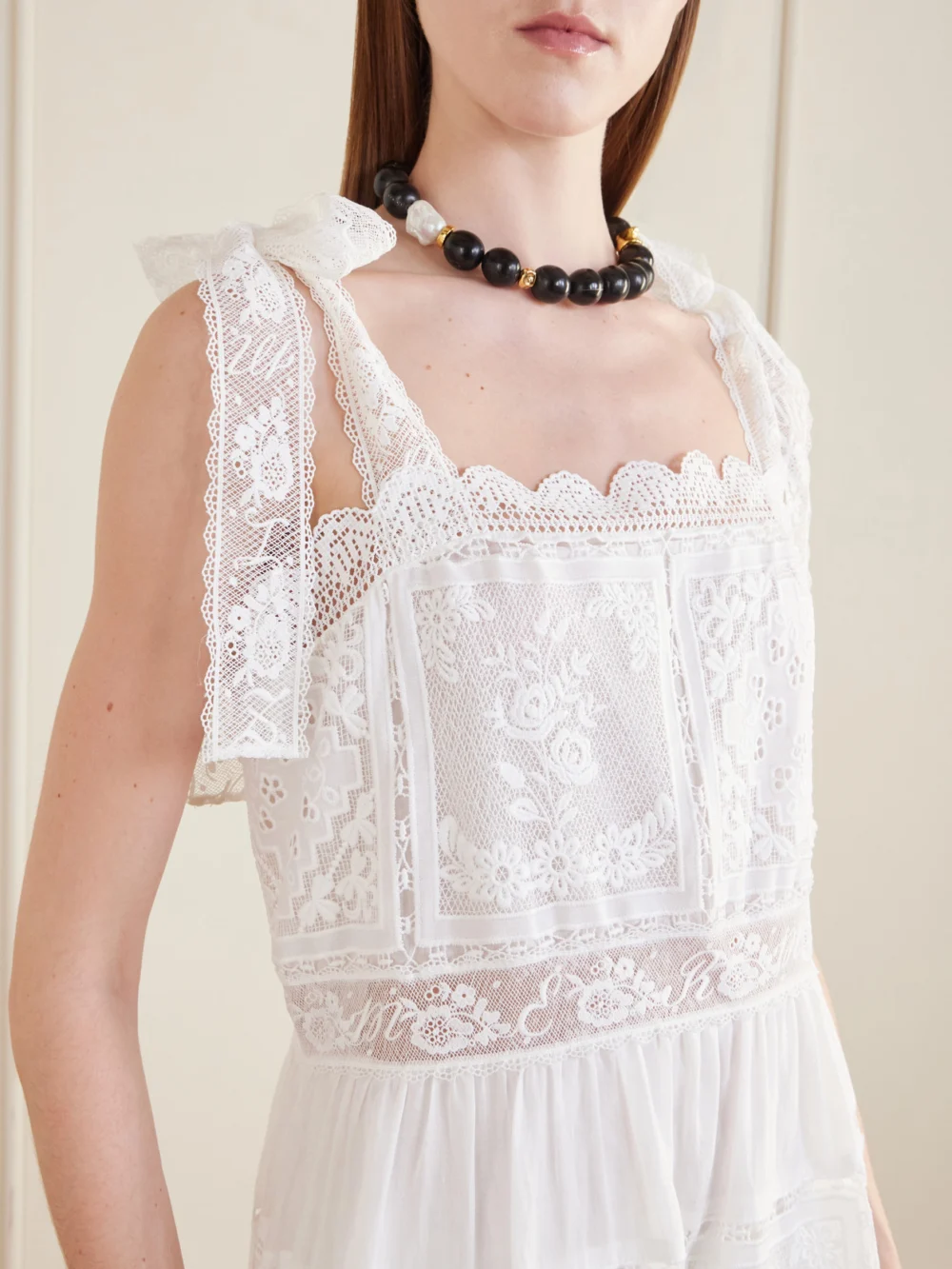 Close-up detail of the Zimmermann Aster Scalloped Lace-trimmed Maxi Dress