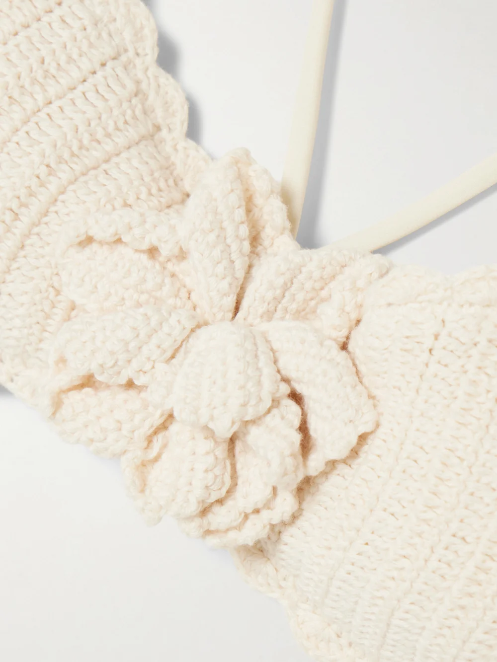 Close-up detail of the Zimmermann Awaken Embellished Crocheted Cotton Halterneck Bikini