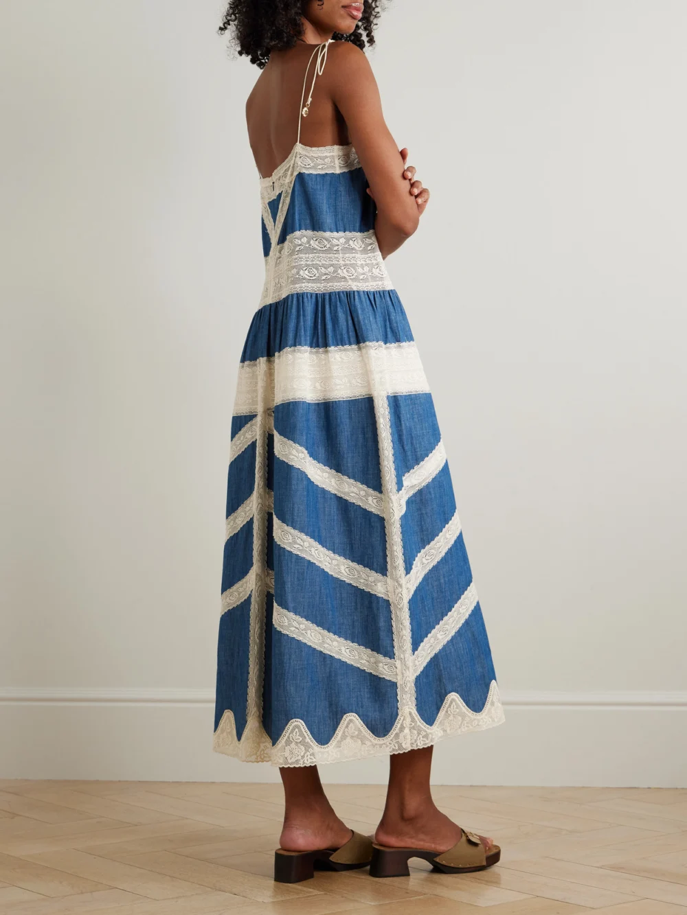 Back view of the Zimmermann Awaken Lace-trimmed Denim Midi Dress