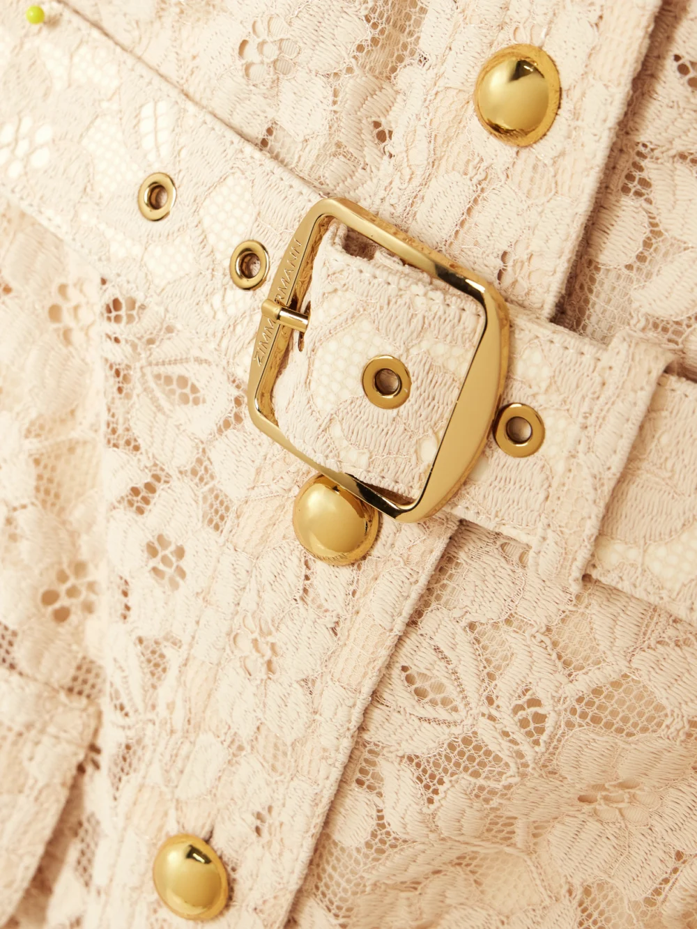 Close-up detail of the Zimmermann Belted Lace Mini Shirt Dress