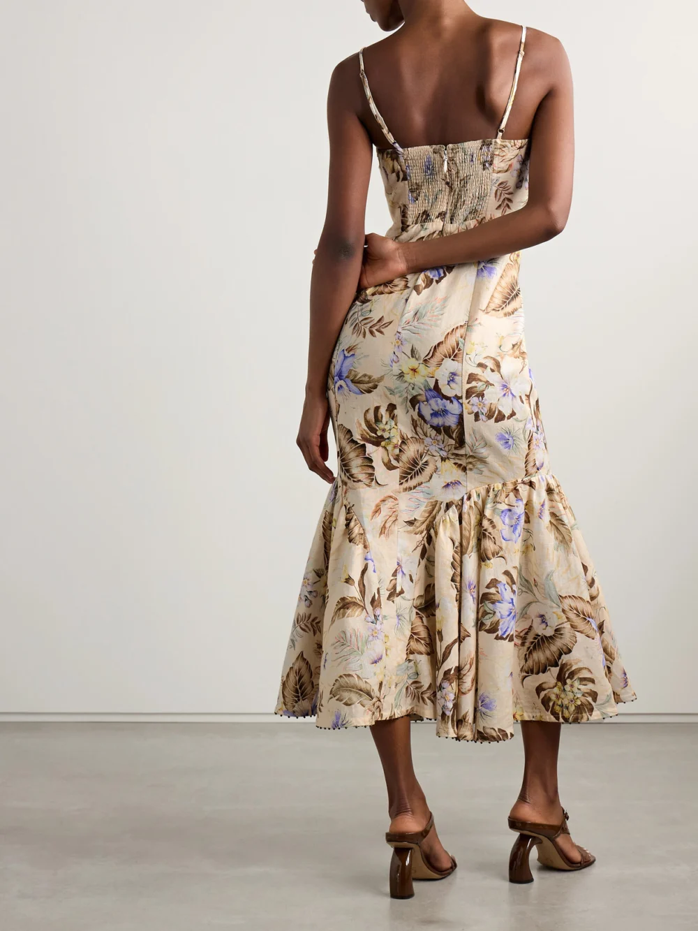 Back view of the Zimmermann Coco Bow-embellished Cutout Floral-print Linen Midi Dress