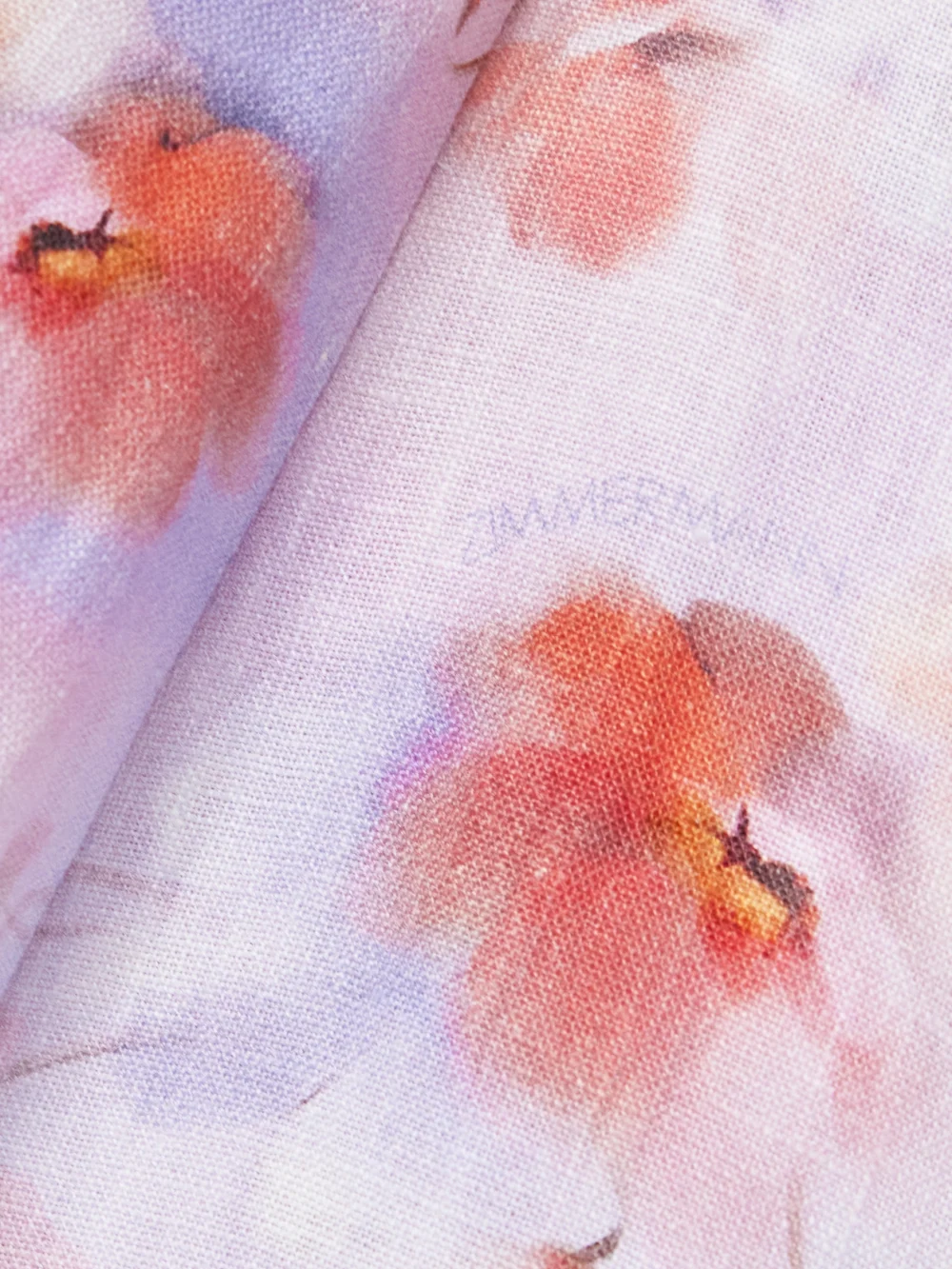 Close-up detail of the Zimmermann Crush Belted Floral-print Linen Midi Dress