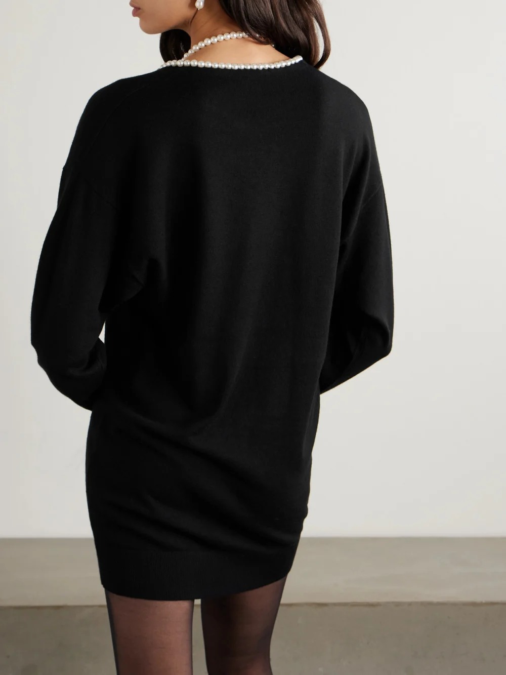 Back view of the Zimmermann Crush Faux Pearl-embellished Wool Mini Dress