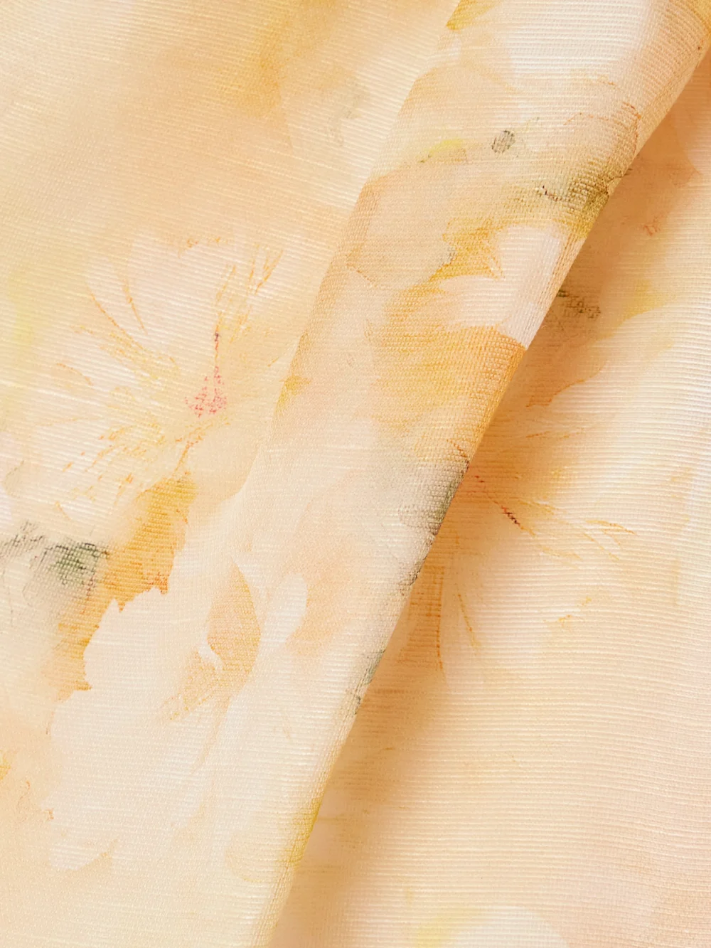 Close-up detail of the Zimmermann Crush One-sleeve Floral-print Linen and Silk-blend Midi Dress