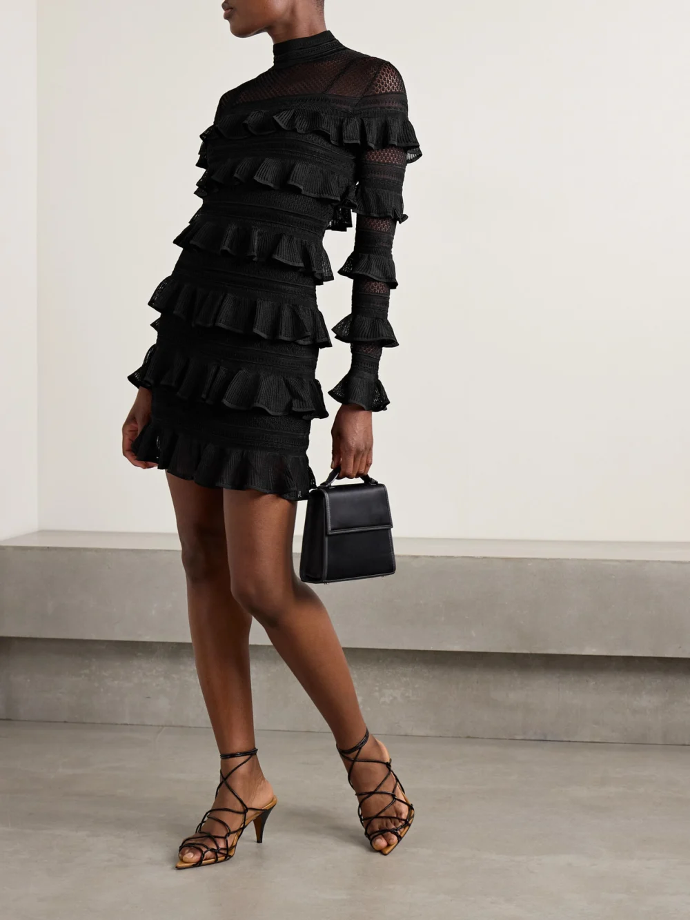 Zimmermann Crush Paneled Ruffled Ribbed-knit and Crochet Mini Dress, worn by a model