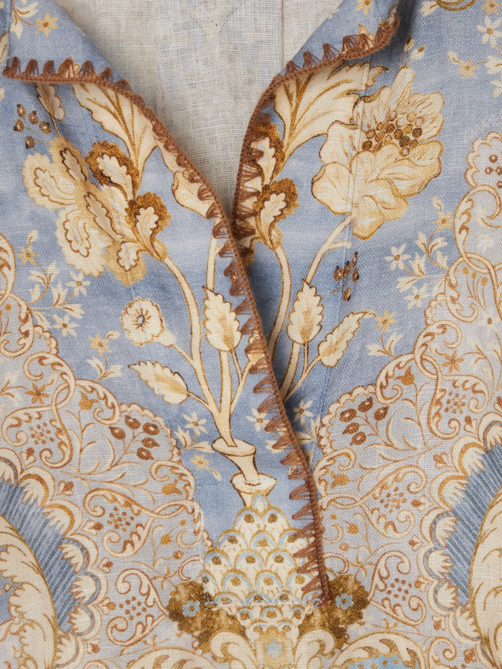 Close-up detail of the Zimmermann Daylight Belted Printed Linen Midi Dress