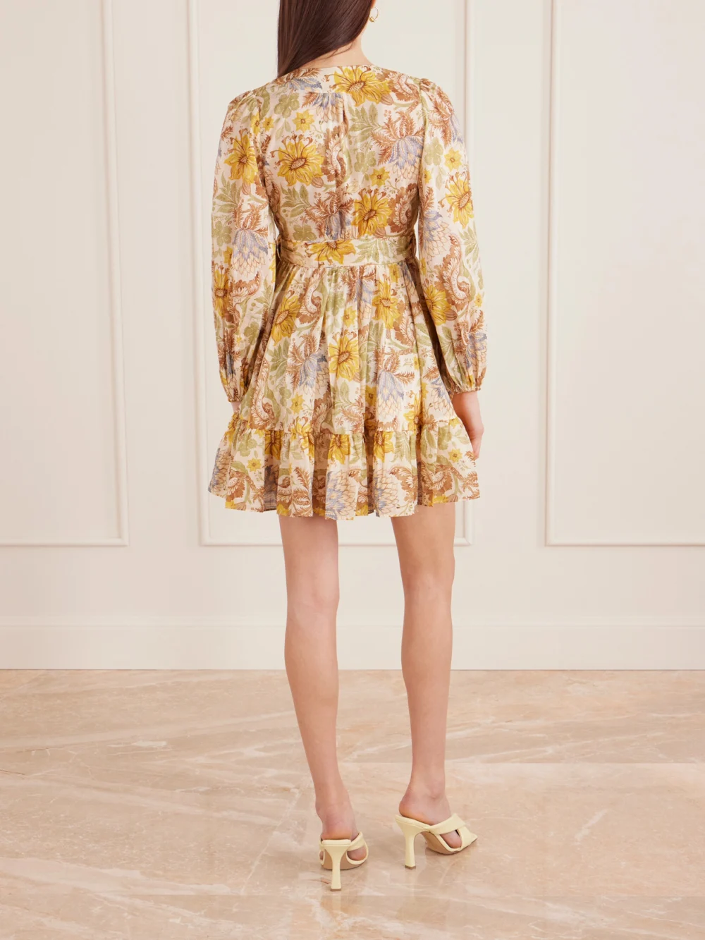Back view of the Zimmermann Daylight Ruffled Floral-print Cotton-voile Mini Wrap Dress