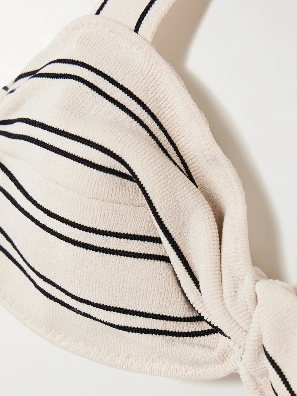 Close-up detail of the Zimmermann Daylight Twist-front Striped Ribbed Stretch-modal Bikini