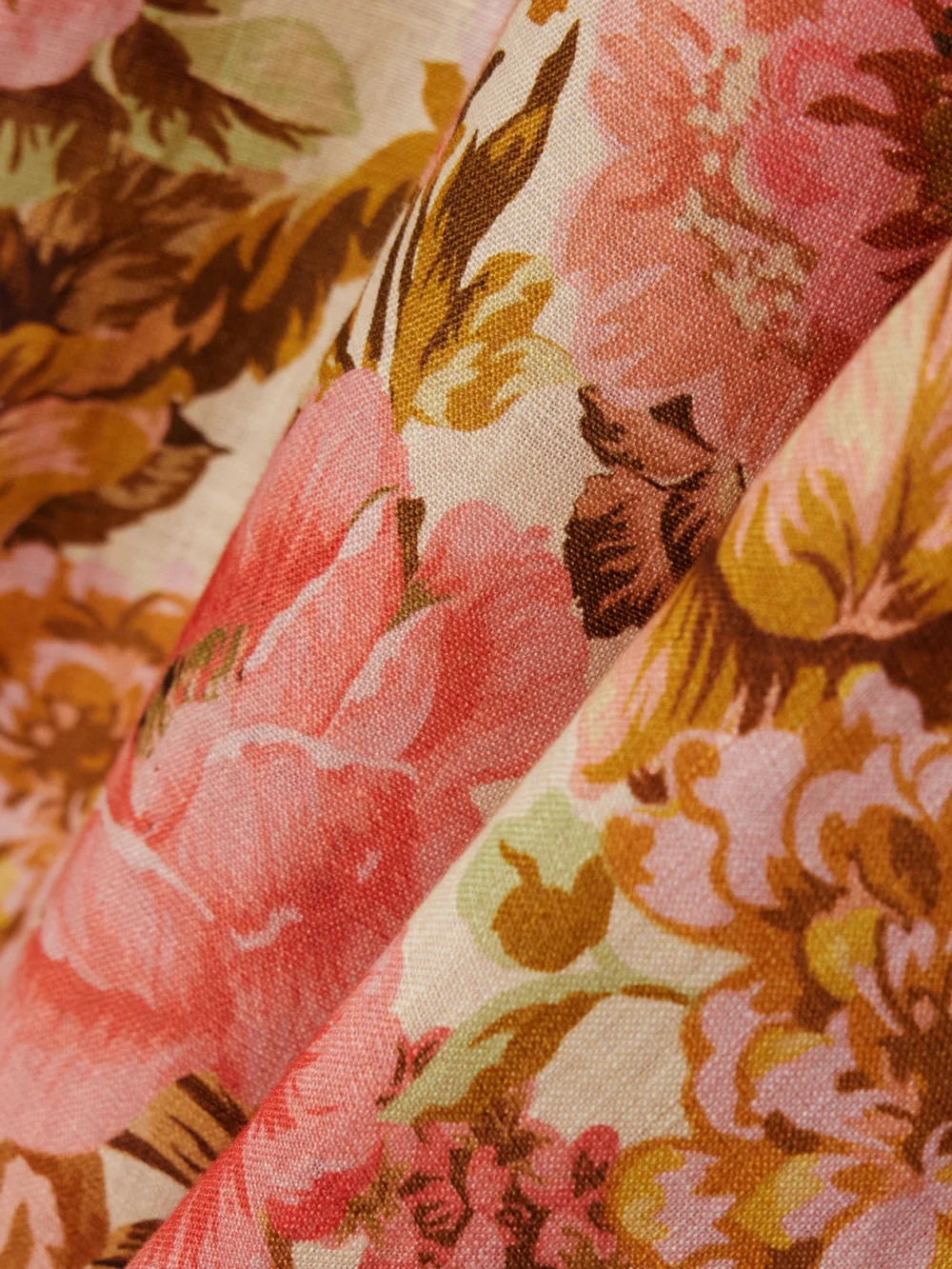 Close-up detail of the Zimmermann Golden Belted Floral-print Linen Maxi Dress