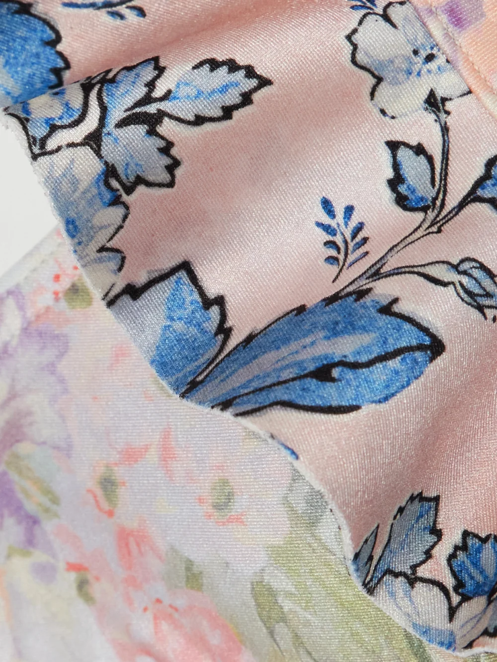 Close-up detail of the Zimmermann Halliday Ruffled Floral-print Bikini Top