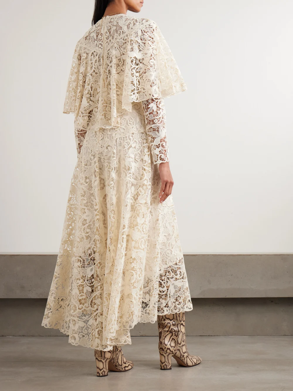 Back view of the Zimmermann Hypnotic Memento Bird Cape-effect Guipure Lace Midi Dress